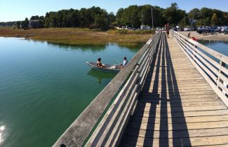 Walking bridge with Footbridge Beach parking-lot in Ogunquit, Maine