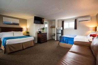 Perkins Cove Suite with Queen bed, Double bed, and Sofa bed. (Sleeps 6)